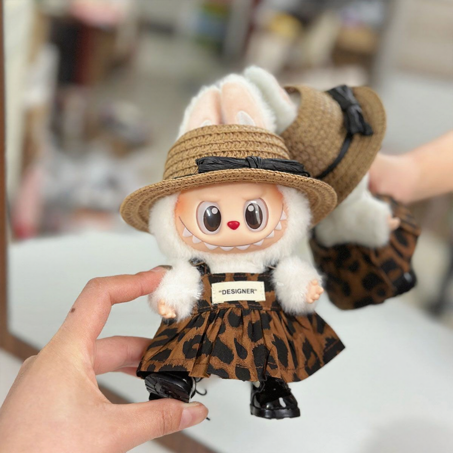 Doll clothes for Generation 1, 2, and 3 Sitting Labubu – Pop Mart figure outfit with leopard-print skirt and straw hat.